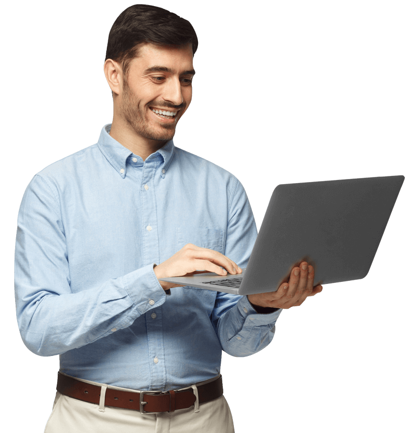a man wearing blue shirt working in laptop